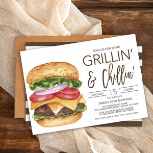 May include: A white invitation card with brown text that reads "Join us for some Grillin' & Chillin'" and details for a birthday party. The card features a watercolour illustration of a hamburger.