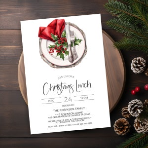 May include: A white invitation card with a watercolour illustration of a Christmas dinner place setting. The invitation reads "Join us for a Christmas Lunch, Dec 24, 12PM, Hosted by: The Robinson Family, The Robinson Home, 555 Celebration Dr | Winter VA 55555, Please join us for a Christmas Lunch to celebrate the season! RSVP with Jamie by Dec 10th at 555-555-5555."