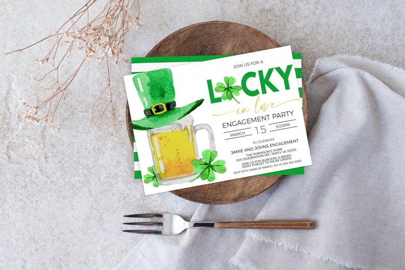 May include: St. Patrick's Day engagement party invitation with a green leprechaun hat, beer mug, and shamrocks. The invitation reads "Lucky in Love" and includes the date, time, and event details. The invitation is on a white background with green accents.