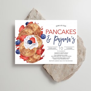May include: Invitation to a pancake and pajama party for Jamie's birthday on February 10th at 10:00 AM. The invitation features a watercolor illustration of pancakes with blueberries, strawberries, and whipped cream.