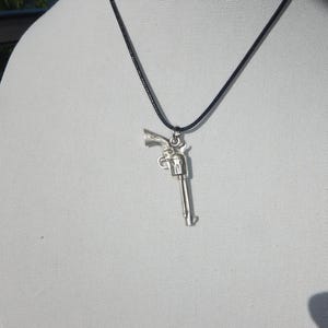 Old Western Six Shooter Pendant on Cord