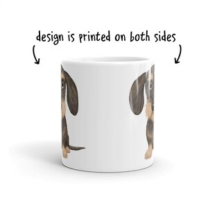 side of coffee mug with cartoon teckel