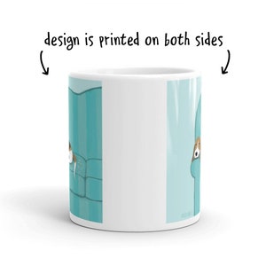 photo of coffee mug shows that the design is printed on both sides