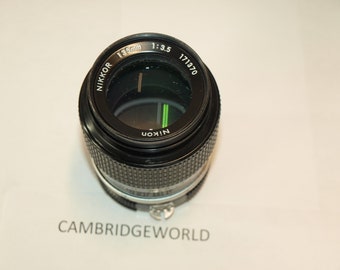 Nikon 135mm F3.5 Ai auto nikkor teleobjetivo