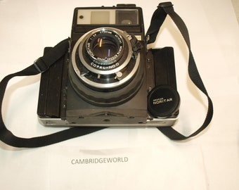 Graflex XL medium format camera with 100mm f3.5 Noritar lens and Polaroid back