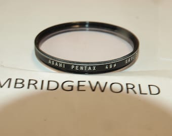 Original Pentax brand 49mm scew in optical glass sky skylight filter