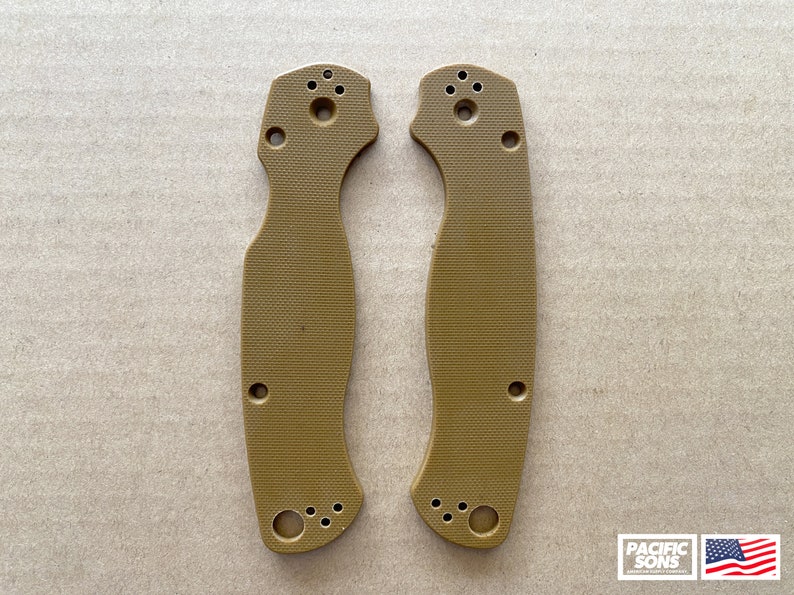May include: Two tan-colored plastic knife scales with a textured surface and multiple holes. The scales are designed to fit a knife handle.