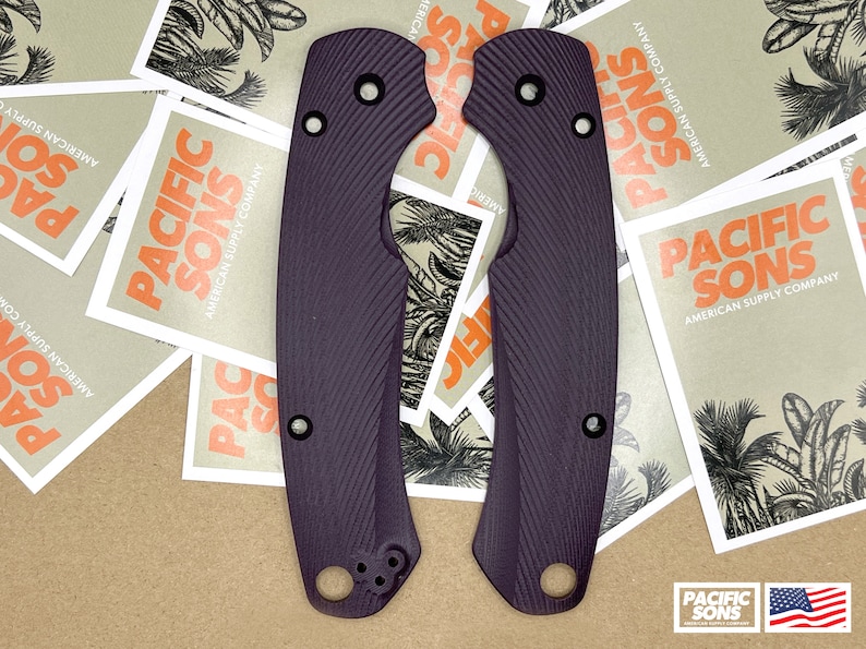 May include: Two purple knife scales with a textured pattern. The scales are made of a durable material and are designed to provide a secure grip.
