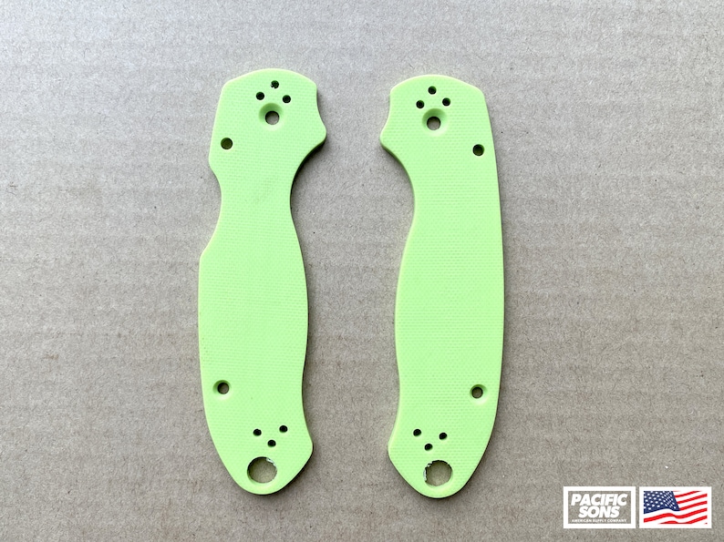 May include: Two lime green knife scales with multiple holes for mounting hardware.