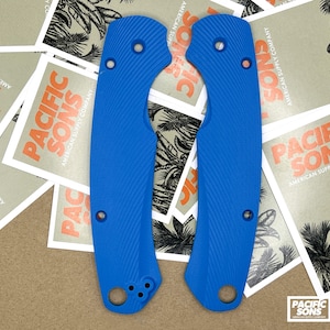 May include: Two blue textured knife scales. The scales are made of a durable material and have a textured surface for a secure grip.
