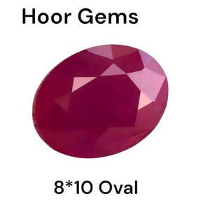 May include: A deep red oval gemstone, measuring 8 by 10 millimetres, with a faceted cut. The gemstone is labelled "Hoor Gems 8*10 Oval".