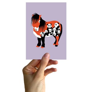 May include: An orange horse with a black mane and tail, with a pattern of black and white panda bears on its body.
