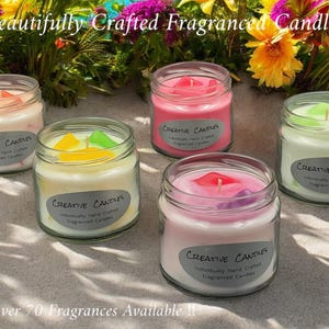 May include: Five fragranced candles in glass jars, with colours including pink, yellow, and green. Each candle has a label reading "Creative Candles". The image also includes the text "Beautifully Crafted Fragranced Candles."