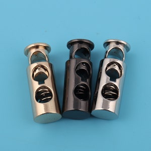 34*12mm Metal Double Hole Metal Cord Stopper Cord Locks Cordlock CordLock Toggles Stopper Spring Stopper Fastner Slider Toggles End