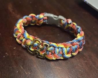 Primary Color Variegated Paracord Bracelet with Puzzle Piece Charm