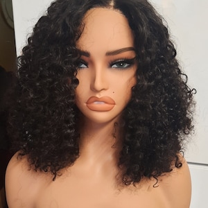 Glueless Eurasian curly glueless  Middle part bob wig  paired with a 2x4 lace closure