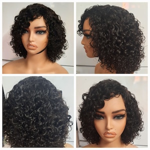 May include: A short, curly, black wig with a side parting. The wig is on a mannequin head.
