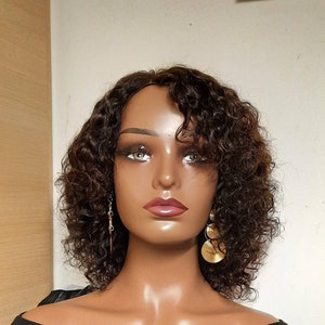 Glueless virgin Peruvian deepcurly wig 4x4 lace closure wig in 12inches.