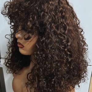 Funmi curly with  bang/fringe  Brazilian  unprocessed Virgin Human  Hair Bob Wigs. 14inches in brown