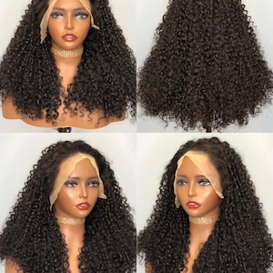 May include: A long, dark brown curly human hair wig with a lace front. The wig is styled in loose curls and is worn on a mannequin head.