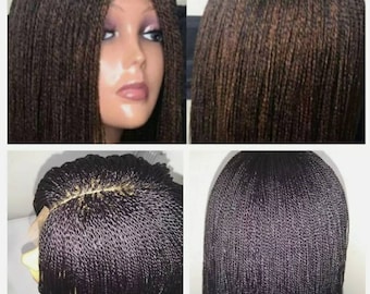 Image of Middle part blunt cut bob with braids
