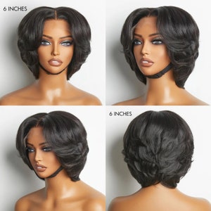 May include: A short, layered black wig, approximately 6 inches in length, styled with soft waves. The wig is shown from multiple angles, including front, side, and back views, showcasing its natural-looking hairline and overall shape.
