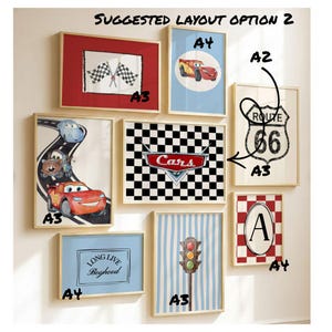 May include: A collection of framed wall art featuring a car theme. The art includes images of race flags, cartoon cars, a Route 66 sign, a checkered flag design with the word "Cars", and a traffic light. Some art pieces have the text "LONG LIVE Boyhood".