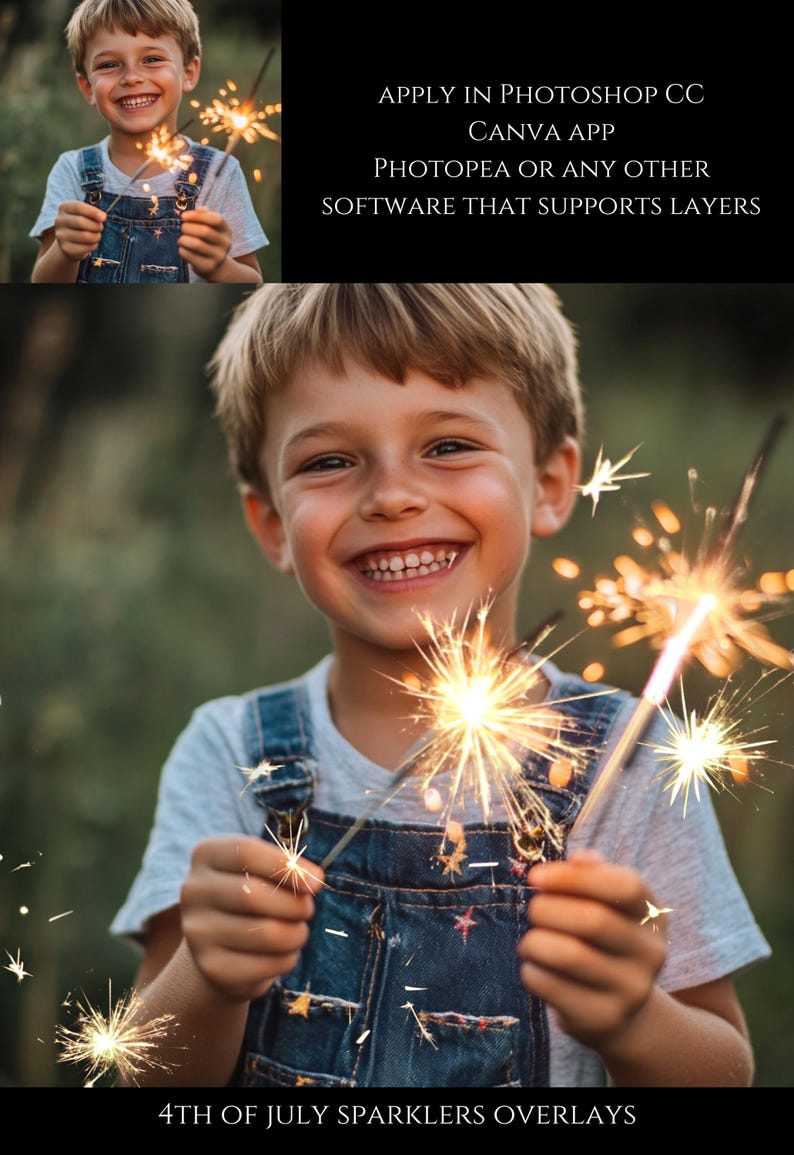 May include: A young boy smiles while holding two sparklers, one in each hand. The sparklers are lit and creating a bright, golden glow. The boy is wearing a blue denim overall and a white t-shirt. The background is a blurred green field.