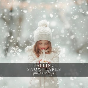 May include: A young girl wearing a white knit hat with a pom pom, a white coat, and a white scarf, stands in a snowy landscape.  She is looking down at her hands, which are holding a small object.  The background is blurred and out of focus, with falling snowflakes visible.  The text "FALLING SNOWFLAKES photo overlays" is displayed at the bottom of the image.