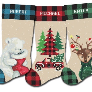 May include: Three personalised Christmas stockings with a plaid pattern at the top. The stocking on the left features a white polar bear holding a red stocking. The middle stocking has a red truck with a Christmas tree in the back. The stocking on the right has a reindeer with a green scarf and antlers with ornaments.