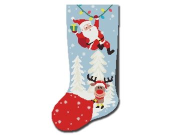 May include: A blue Christmas stocking with a red and white Santa Claus hanging from a string of lights and a reindeer peeking out from the top of the stocking.