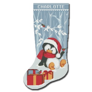 May include: A blue Christmas stocking with the name "CHARLOTTE" embroidered on the top. A penguin wearing a red scarf and Santa hat is holding a gift box. Two wrapped gifts are at the bottom of the stocking.