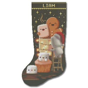 May include: A Christmas stocking with a pixelated design featuring a gingerbread man, marshmallows, and a character wearing a Santa hat. The name "LIAM" is at the top. The stocking is dark green with yellow accents.