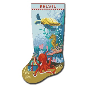 May include: A Christmas stocking with a blue background featuring an octopus, a seahorse, and a sea turtle. The stocking is personalized with the name "Kristi".