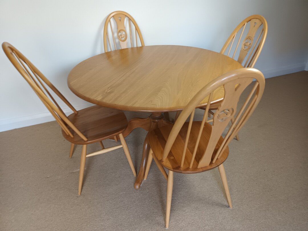 Mid Century Blonde Ercol Round Dining Table & Four Ercol Swan Back