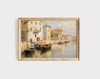 May include: A painting of a canal scene with buildings lining the water's edge. The buildings are painted in shades of white, yellow, and orange. There are several boats docked along the canal, and the water is a calm blue-green color. The sky is a light blue with some white clouds.