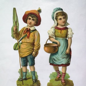 Antique Victorian era die cut figurines. Vintage boy and girl figurines. Die cut perfect for scrapbooking. Original vintage.