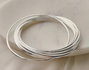 Dainty Sterling silver thin round staking bangle set bracelet, 1.5mm thin round Bangle, set of 9 Bangles, Sterling silver bangles