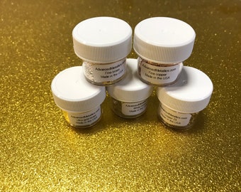 May include: Five small jars of metallic powder, labeled with the brand name "Advanced Metallics" and the type of metal: "Fine Brass", "Ultra Gold Brass", "White Fine Copper", "Fine Copper", and "Copper 25".