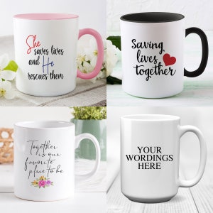 May include: Four white ceramic mugs with black handles. The mugs have different text printed on them. The first mug has pink trim and says "She saves lives and He rescues them". The second mug has a black rim and says "Saving lives together" with a red heart. The third mug says "Together is our favorite place to be" with a floral design. The fourth mug says "YOUR WORDINGS HERE".