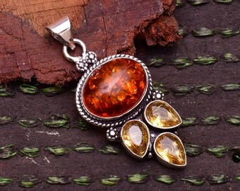 Colgante de ámbar báltico y plata de ley: joyería artesanal con piedras preciosas.