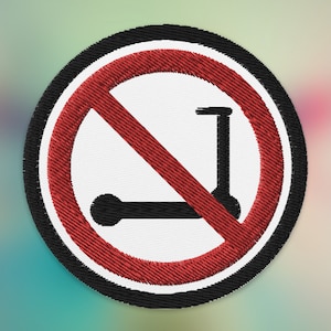 May include: A red circle with a diagonal line through it, prohibiting the use of scooters. The circle has a black border and is embroidered.