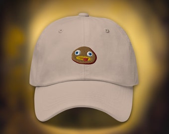 Sombrero bordado sobre la pared del jardín, hecho de la roca, regalo sobre la pared del jardín, tomo de lo desconocido, sobre la pared del jardín, hecho de la roca de Greg