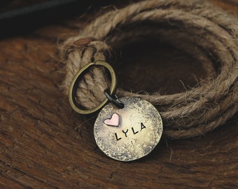 Rustic, round dog tag made of brass · ID tag for pets ·