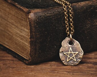 small brass pendant with pentagram · nugget · magical · witch ·