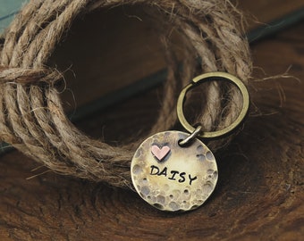 Rustic, round dog tag made of brass · ID tag for pets ·