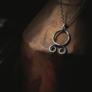 small silver troll cross  · Viking jewelry ·