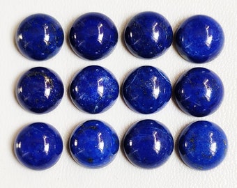 May include: Twelve round, polished lapis lazuli cabochons, each with a deep blue color and flecks of gold pyrite.