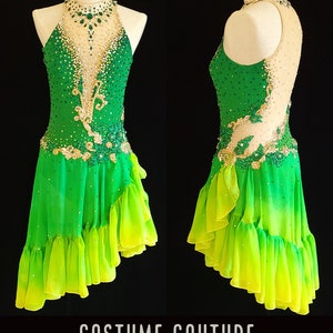 May include: A green and yellow custom-designed figure skating dress with a halter neckline, beaded embellishments, and a layered skirt. The dress is shown on a white dress form.