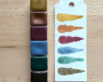 Tavolozza di colori ad acquerello fatti a mano per paesaggi invernali